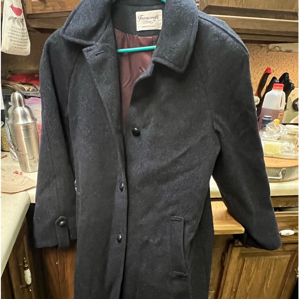 Beautiful wool coat size 10 made in USS, shell is wool, liner is acetate.
